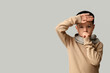 © Pixel-Shot - Ill little Asian boy coughing on light background