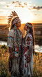© Cadengo - A Native American couple is seen in the image, standing in front of a body of water