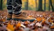 © Mityarko - Suede Sneakers on Autumn Leaves