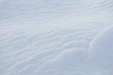 Wall Mural - ripple pattern on fresh white snow texture background