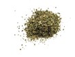 © Foodmar - Aromatic portion of dried lovage leaves, on a bright background.