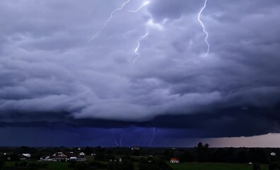 dramatic lightning and thunder illuminate stormy sky over rural landscape, showcasing awe inspiring 