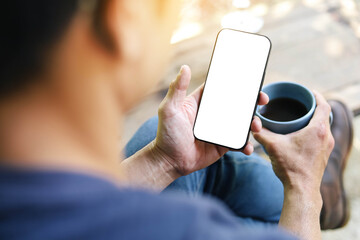 mobile phone blank white screen mockup.texting using cell phone.background empty space for advertise