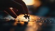 © marco - Hand Placing Puzzle Piece into Puzzle