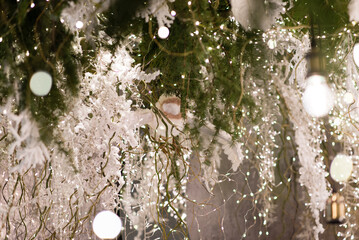 Wall Mural - merry christmas and new year holidays background. blurred bokeh background with light bulbs and chri