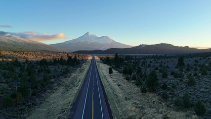 Wall Mural - Amazing ascending view of Mount Shasta volcano in California in early November seen from route 97, the volcanic scenic byway, at sunset.