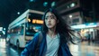 © Roey - Scared Young Woman Running Down Rainy City Street at Night with Backpack, Blue Jacket, and Dark Makeup