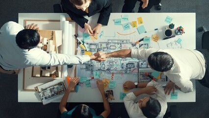 Poster - top aerial view of manager shaking hand and making contract at meeting table with blueprint and hous