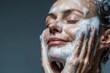 © Stock Planet - portrait of a woman washing her face, health and beauty ad concept