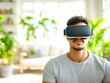 © Manita - Man using virtual reality headset indoors.