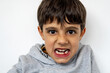 © ADDICTIVE STOCK - Young child showing excitement about losing a baby tooth