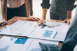 © ARMMY PICCA - Fund managers team consultation and discuss about analysis Investment stock market at office