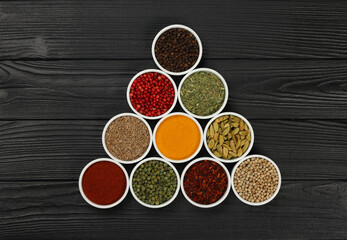 Poster - Triangle of assorted spices in bowls