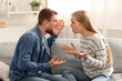 © Prostock-studio - Relationship problem. Emotional man and woman quarreling because of family money