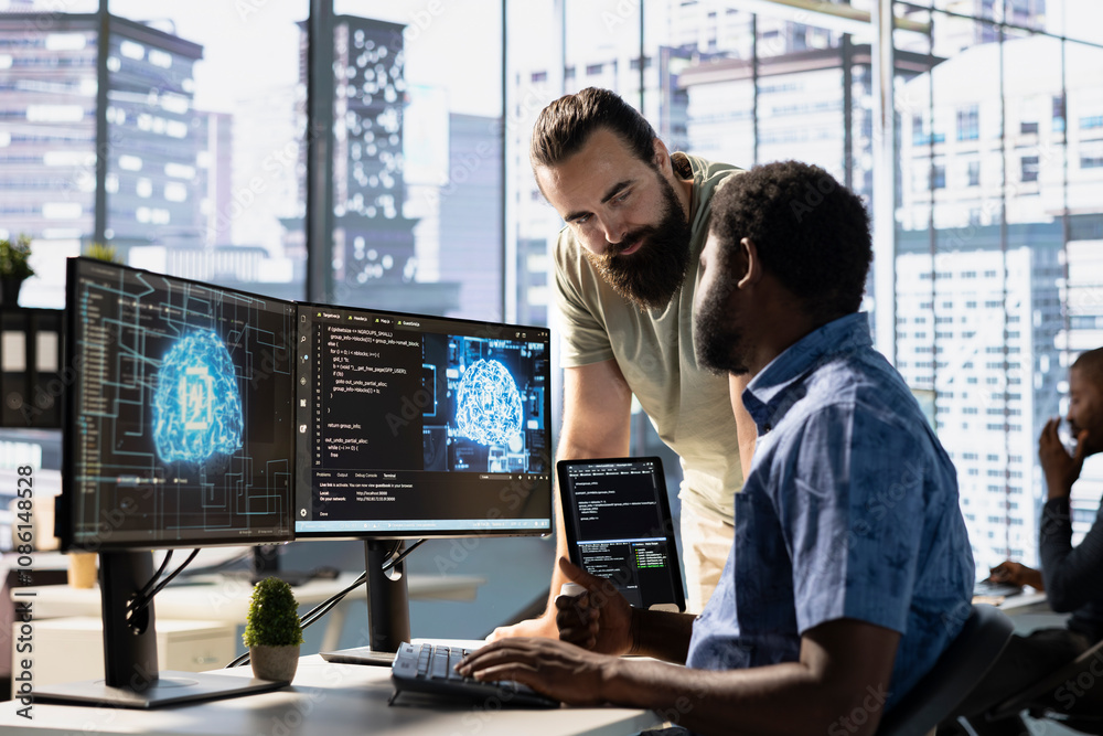 IT staff members testing and deploying artificial intelligence programs ...