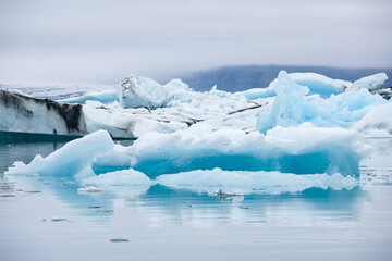 Wall Mural - Icebergs swimming on Jokulsarlon glacier lagoon in Iceland