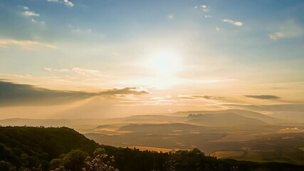Wall Mural - 4K time lapse capturing majestic sunrise sunset sky landscape mesmerizing light nature Watch colorful clouds move roll creating stunning cloudscape ideal travel serene background footage