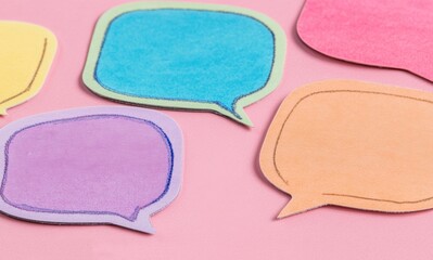 Poster - Brightly colored speech bubbles arranged on a multicolored background invite creativity and interaction in conversations or messaging