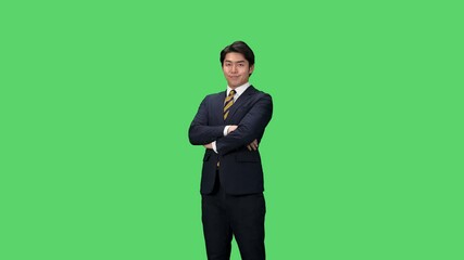 Leinwandbilder - 腕組みする男性ビジネスパーソン　クロマキー合成用グリーンバック映像