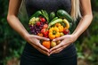 © InfiniteStudio - A woman holds her hands in a heart shape around fresh fruits and vegetables promoting gut health and nutrition outdoors in the sunlight