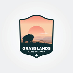 Wall Mural - grasslands national park with a bison looking at the sunset vector design, canada national park logo