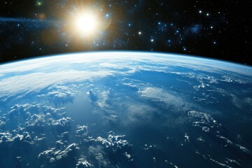 Wall Mural - Earthrise with the sun shining over clouds.