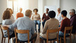 © marie - Diverse group of people sitting in a circle during a support or therapy session in a bright room, fostering connection and healing.