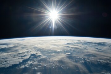 Wall Mural - The sun shines brightly over Earth's horizon, seen from space.