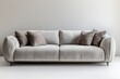 © grey - Minimalistic Modern Sofa in Empty Room: Simple, elegant sofa set against a blank wall, conveying sophistication in a minimalist interior setting.