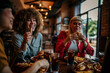 © La Famiglia - A Group Of Women Enjoying Lunch Date In Delicatessen Restaurant