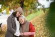 © Halfpoint - Portrait of a granddaughter on an autumn walk in the park with her grandmother.