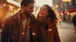 © tetxu - Young multiracial couple in love on the streets at Christmas