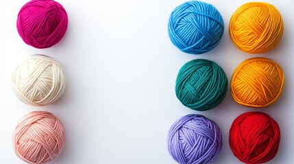 Poster - Row of colorful yarn balls on a white background. The colors are pink, purple, blue, green, yellow, orange, and white