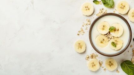 Wall Mural - Fresh banana slices and yogurt, energizing morning snack, nutritious and light