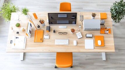 Leinwandbilder - Overhead perspective of a meticulously organized and modern office workspace featuring a long table with neatly arranged computers electronics and other work equipment