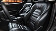 © Ajay - Luxurious black leather car seats with elegant stitching and modern interior design.