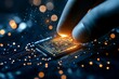 © NEW - A close-up of a hand touching a glowing microchip on a dark circuit board.