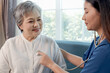 © Stella - Happy Asian mature receiving checkup and advice from medical staff. Beautiful female doctor using stethoscope to examine senior woman. Nurse listening heartbeat of retirement grandma. elderly homecare