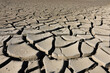 © Silviu - A riverbed dried up and cracked soil due to the lack of water and precipitation but also very high temperatures. Dried up river.