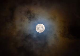 Wall Mural - full beaver moon shining through the clouds november 2024 above ottawa, canada