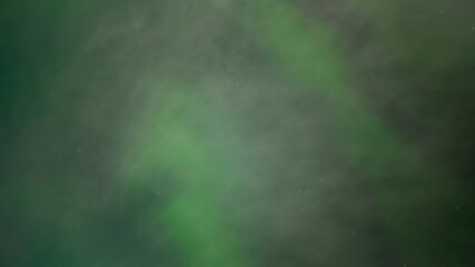 Wall Mural - time lapse of flashing green aurora in a starry night sky. only sky shown.