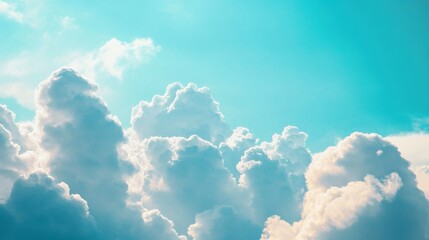 Poster - Soft, white clouds billow in the sky, creating a serene and calming atmosphere during a sunny afternoon, perfect for relaxation and daydreaming. Generative AI