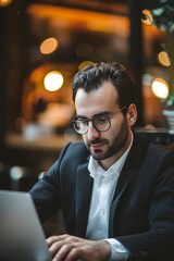 Poster - Professional Man Working on Laptop in Modern Office