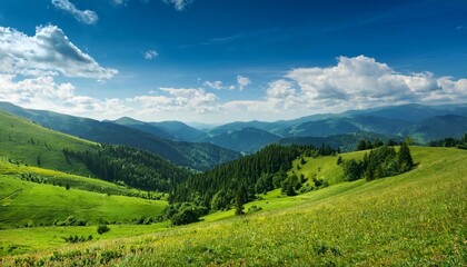 Wall Mural - scenic views on mountain and valley at summer green meadows and forests slopes hilly countryside blue sky with clouds beautiful landscape travel background wallpapers and banner