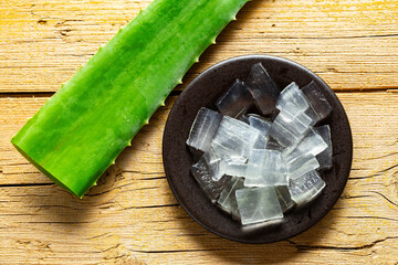 Wall Mural - Aloe vera leaves on a light background