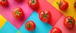 © The 2R Artificiality - Colorful Tomatoes on Geometric Background from Above