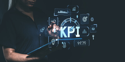 Poster - Businesswoman interacting with KPI dashboard on a digital screen