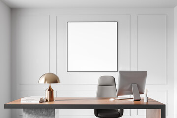 Poster - Empty poster mockup on a wall above a modern office desk with a computer and lamp. Minimalist design in a bright workspace. 3D Rendering