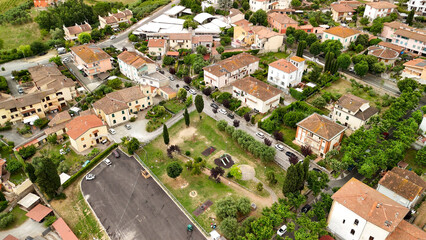 Wall Mural - Aerial view of the historic center of Casciana Terme, Pisa, olive trees and vineyards in the background