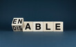 © Prazis Images - Wooden blocks spelling Enable or Disable